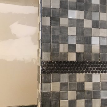 All Western Slope FIX-ology - a tiled shower - General Contractors Near Me