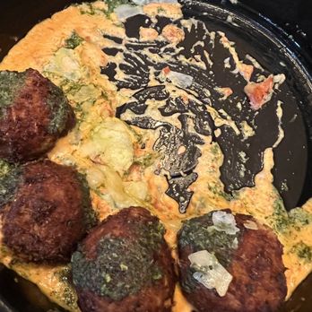 The Common Man - Flavorless arancini in an equally flavorless sauce. - American Near Me - Merrimack, New Hampshire The Common Man - Flavorless arancini in an equally flavorless sauce. - American Near Me - Merrimack, New Hampshire