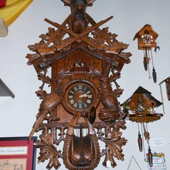 Schnitzelbank - A gigantic cuckoo clock in the gift shop - the one to the right is a normal size! - American Near Me - Jasper, Indiana