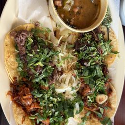 Carnitas and barbacoa tacos with beans Carnitas and barbacoa tacos with beans