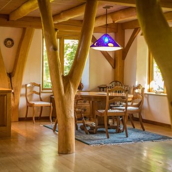 TimberHomes Vermont - Poconos dining room with forked posts. - Architects Near Me - Montpelier, Vermont TimberHomes Vermont - Poconos dining room with forked posts. - Architects Near Me - Montpelier, Vermont