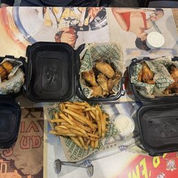 Ultimate meal deal. 20pcs bone in wings Large fries 2 sauces. Large drink (not included) 5 corn pieces (not included) Ultimate meal deal. 20pcs bone in wings Large fries 2 sauces. Large drink (not included) 5 corn pieces (not included)