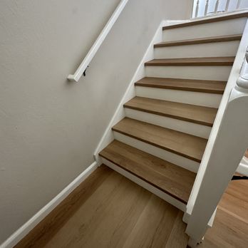 Unique Hardwood Floors - a staircase leading to a second floor - Flooring Near Me - Concord, California Unique Hardwood Floors - a staircase leading to a second floor - Flooring Near Me - Concord, California