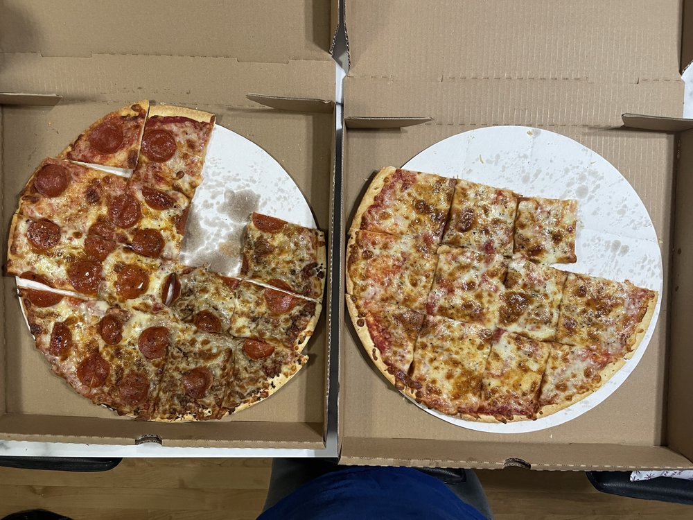 Zion Brothers Subs & Pizza’s Logo