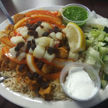 Blue Star Cafe - Chicken on a bed of basmati rice with sauteed peppers and onions, with potatoes and raisins. Salad on the side. - Halal Near Me - Milwaukee, Wisconsin Blue Star Cafe - Chicken on a bed of basmati rice with sauteed peppers and onions, with potatoes and raisins. Salad on the side. - Halal Near Me - Milwaukee, Wisconsin