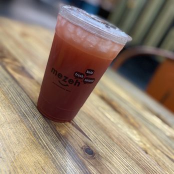 Mezeh - A mixture of their specialty drinks. This was Berry Watermelon, Strawberry Lemonade and Mango Punch. - Salad Near Me - Chesapeake, Virginia Mezeh - A mixture of their specialty drinks. This was Berry Watermelon, Strawberry Lemonade and Mango Punch. - Salad Near Me - Chesapeake, Virginia