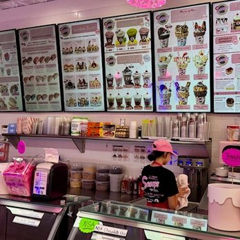 Scoops Ice Cream & Milkshake Bar - Big menu board with a variety of options at Scoops - Ice Cream & Frozen Yogurt Near Me - Boynton Beach, Florida Scoops Ice Cream & Milkshake Bar - Big menu board with a variety of options at Scoops - Ice Cream & Frozen Yogurt Near Me - Boynton Beach, Florida