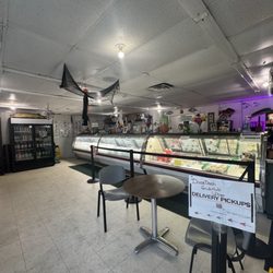 Eastside Fish Fry & Grill - Deli counter, soda coolers, booth seating to the left off screen.