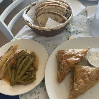 Acropolis Greek Restaurant - Spanakopita lunch plate with green beans and potatoes with warm puta bread for the table. Delicious. - Greek Near Me - Biloxi, Mississippi