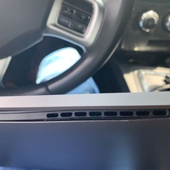 Hackers Ink - "Bulging" battery which was not like this when I left it with them . Assembly not correctly assembled - IT Services & Computer Repair Near Me - Ellicott City, Maryland