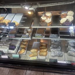 Glass case of pastries and hot food Glass case of pastries and hot food