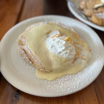 Moke’s Bread And Breakfast - Short stack lilikoi pancakes ($10.95) IG: @ohmyono - Breakfast & Brunch Near Me - Honolulu, Hawaii Moke’s Bread And Breakfast - Short stack lilikoi pancakes ($10.95) IG: @ohmyono - Breakfast & Brunch Near Me - Honolulu, Hawaii