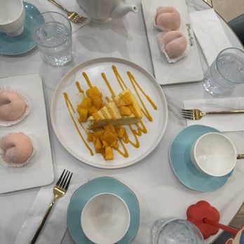 Mango Mango Dessert - Table Set- (Oolong Peach Mochi & Mango Mille Crepe Cake) - Desserts Near Me - Las Vegas, Nevada