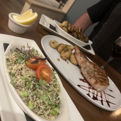 Harvest & Reel - Pork chop and couscous