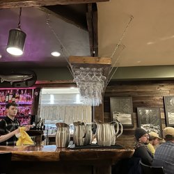 Canyon River Grill - Bar glass wear and view of kitchen