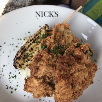 Nick's On 2nd - Fried chicken served over mashed potatoes with a biscuit and grilled corn. - New American Near Me - Long Beach, California Nick's On 2nd - Fried chicken served over mashed potatoes with a biscuit and grilled corn. - New American Near Me - Long Beach, California