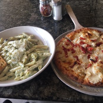 Pesto's - Ziti and chicken pasta (sans marinara garnish) and crab pizza - Pizza Near Me - Chandler, Arizona