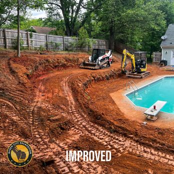 Queen City Improvements - a pool being built - Landscaping Near Me