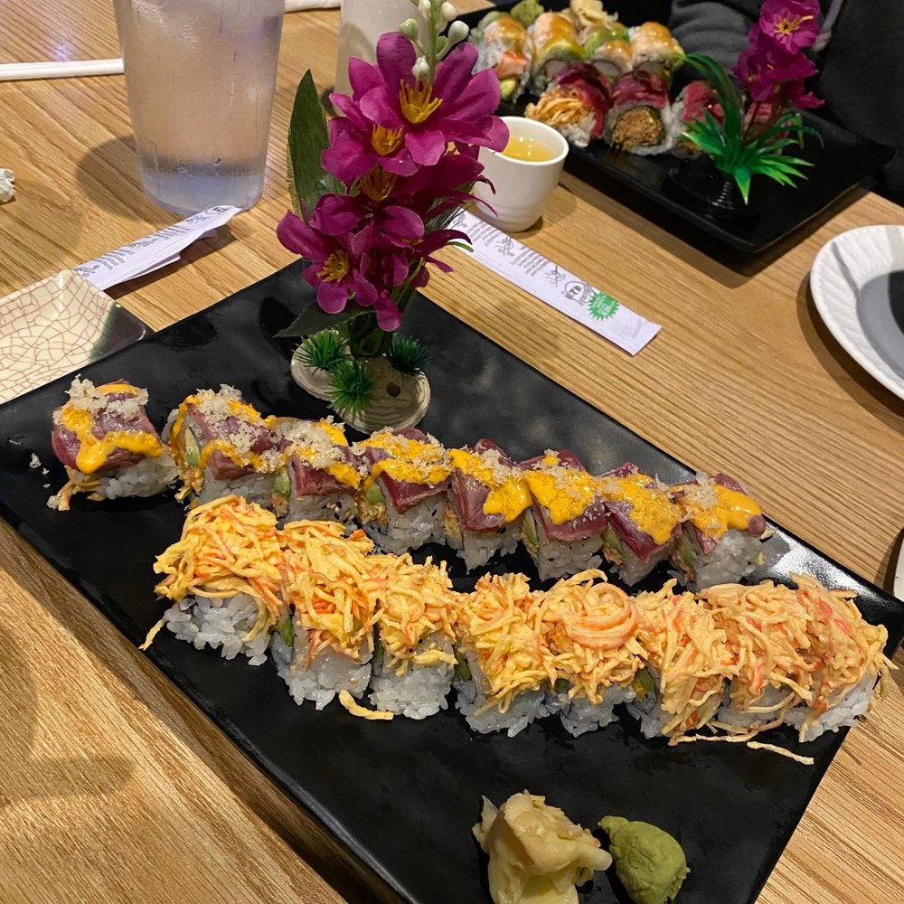 a plate of sushi on a table a plate of sushi on a table