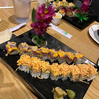 Happy Sushi - a plate of sushi on a table - Sushi Bars Near Me - Lexington, Kentucky Happy Sushi - a plate of sushi on a table - Sushi Bars Near Me - Lexington, Kentucky