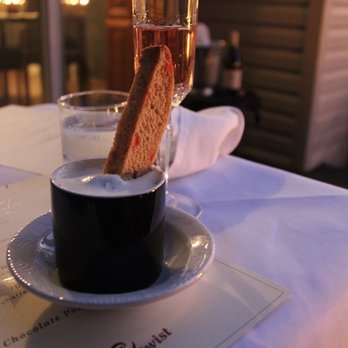 Olive & Twist 216 - a glass of wine and a biscuit - Seafood Near Me
