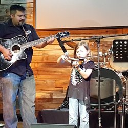 Tyler Music Academy - Owner Will Burgin with Brookelyn playing Violin.