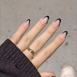 reference pic of nails: med. length black french tip