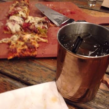 Flo & Santos - Italian beef and giardinera pizza with a Moscow mule - Pizza Near Me - Chicago, Illinois
