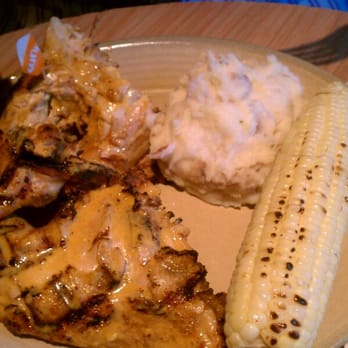 Nando's Peri-Peri - Half chicken, medium, with mash potatoes and corn - Portuguese Near Me - Arlington, Virginia Nando's Peri-Peri - Half chicken, medium, with mash potatoes and corn - Portuguese Near Me - Arlington, Virginia