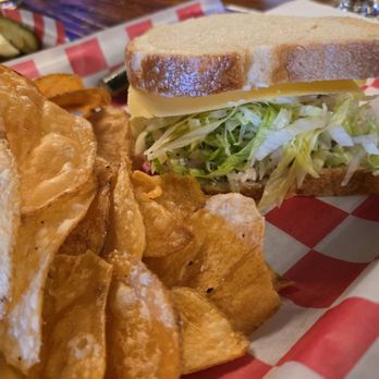 Old World Deli - Chicken salad sandwich - served with fresh potato chips and a pickle. - Delis Near Me - Corvallis, Oregon Old World Deli - Chicken salad sandwich - served with fresh potato chips and a pickle. - Delis Near Me - Corvallis, Oregon