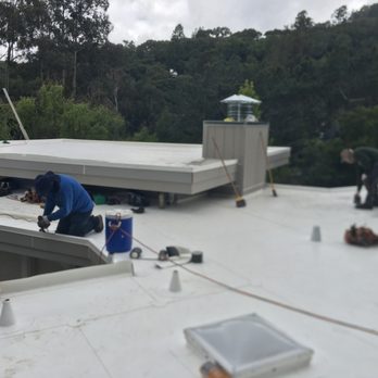 Tom Lee Roofing - Putting the finishing touches on a gorgeous multi-layered PVC flat roof - Roofing Near Me - Daly City, California