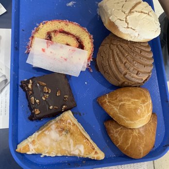 Carlos Bakery - a blue tray with a variety of pastries - Bakeries Near Me - Sunland Park, New Mexico Carlos Bakery - a blue tray with a variety of pastries - Bakeries Near Me - Sunland Park, New Mexico