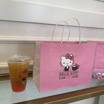 Hello Kitty Cafe - Our tea and water bottle purchase. Cute bag! - Cafes Near Me - Irvine, California