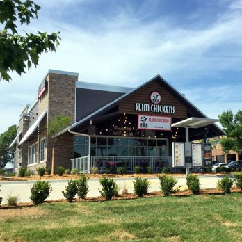 Slim Chickens - Restaurant Exterior with Drive-thru and Patio - Chicken Wings Near Me - Lenexa, Kansas Slim Chickens - Restaurant Exterior with Drive-thru and Patio - Chicken Wings Near Me - Lenexa, Kansas