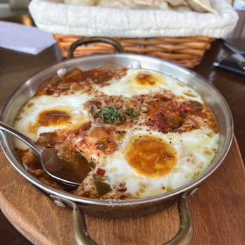 Tarbouch Mediterranean Grill - Eggs Bil Shakshuka Pan - Mediterranean Near Me - Arlington, Virginia Tarbouch Mediterranean Grill - Eggs Bil Shakshuka Pan - Mediterranean Near Me - Arlington, Virginia