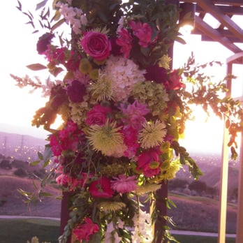Bella Fiori - Wedding ceremony flowers (on arch) - Florists Near Me