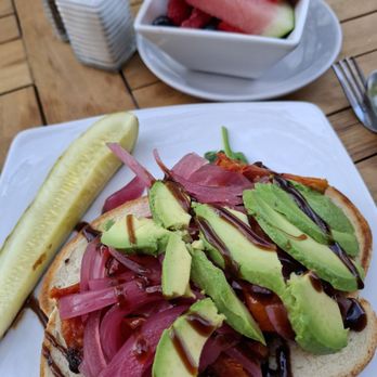 Midtown Social - Avocado "toast" with a bowl of fruit. - Pancakes Near Me - Detroit, Michigan
