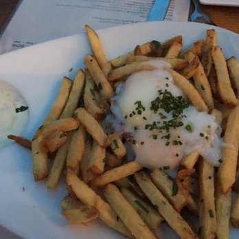 Salty Sow - Duck fat fries with an egg on top... - American Near Me - Austin, Texas Salty Sow - Duck fat fries with an egg on top... - American Near Me - Austin, Texas