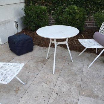 Kimpton Brice Hotel - Staff apparently has not took the initiative to the time to put the patio in order and wipe the tables down. - Hotels Near Me - Savannah, Georgia