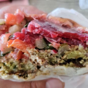 Falafelle - Pita Pocket (excuse the look as I was already a few bites in) - Vegan Near Me - Belmont, California Falafelle - Pita Pocket (excuse the look as I was already a few bites in) - Vegan Near Me - Belmont, California