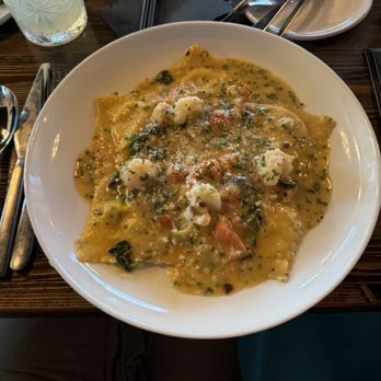 Mo and Hari's Neighborhood Bistro - Handmade ravioli stuffed with lump crabmeat & crawfish topped with shrimp - Italian Near Me - Midlothian, Texas Mo and Hari's Neighborhood Bistro - Handmade ravioli stuffed with lump crabmeat & crawfish topped with shrimp - Italian Near Me - Midlothian, Texas