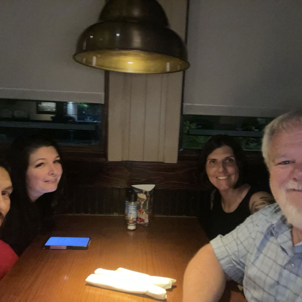 Family getting together for dinner and drinks without the kids. Family getting together for dinner and drinks without the kids.
