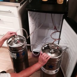 My better half setting up our kegs My better half setting up our kegs