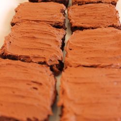 Maggie's Munchies - Thick Chewy Brownies with smooth frosting that balances nicely with the rich chocolaty flavor