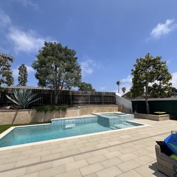 Western Pavers - Full view of paver pool deck, new turf, retaining wall and drainage installed. - Masonry/Concrete Near Me - San Marcos, California Western Pavers - Full view of paver pool deck, new turf, retaining wall and drainage installed. - Masonry/Concrete Near Me - San Marcos, California