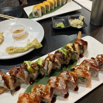 Yoshi Sushi - from top to bottom: Mango Secret Roll, Dragon Roll, Hotel California Roll - Japanese Near Me - Milpitas, California Yoshi Sushi - from top to bottom: Mango Secret Roll, Dragon Roll, Hotel California Roll - Japanese Near Me - Milpitas, California