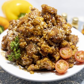 Chi+Mac - a plate of food with broccoli and tomatoes - Chicken Wings Near Me - El Centro, California Chi+Mac - a plate of food with broccoli and tomatoes - Chicken Wings Near Me - El Centro, California