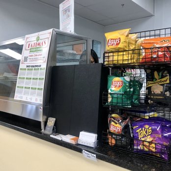 Fatima's Fusion Flavors - Counter with hot goods & chips - Asian Fusion Near Me - Manchester, Connecticut Fatima's Fusion Flavors - Counter with hot goods & chips - Asian Fusion Near Me - Manchester, Connecticut
