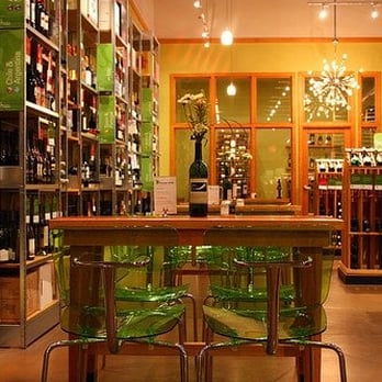 House Wine - a wine shop with green chairs - Beer, Wine & Spirits Near Me - Worthington, Ohio