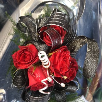 The Flower Pot - Red rose corsage with black ribbon. - Floral Designers Near Me - Lancaster, Ohio The Flower Pot - Red rose corsage with black ribbon. - Floral Designers Near Me - Lancaster, Ohio